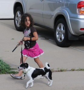 Our granddaughter, Dulcea, walks Shiloh