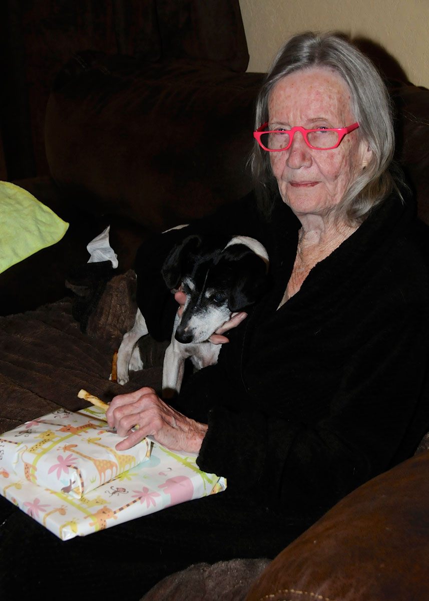 Mom on her 80th birthday, with Buddy